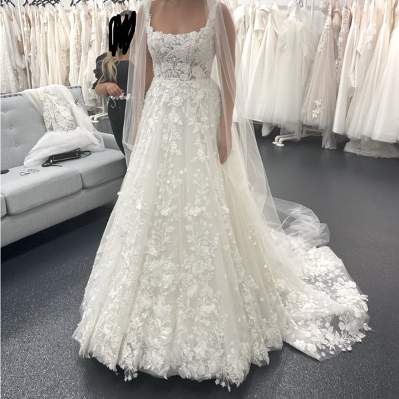 Martina Liana: ivory beaded floral A-line wedding dress with tulle train - Picture 3 of 6